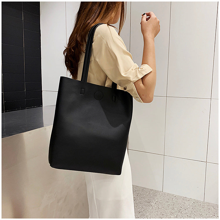 alt="Small Vertical Square Tote Bag in Light Brown - Front View"
alt="Soft Leather Shoulder Bag with Zipper Pocket - Interior Detail"
alt="Elegant Tote Bag with Car Suture Detailing - Close Up"
alt="Small Vertical Square Shoulder Bag in White - Side Angle"
alt="Portable Tote Bag with Open Pocket - Lifestyle View"
alt="Soft Handle Tote Bag in Wiping Green - Carrying Position"
alt="Black Small Vertical Square Tote - Full Product View"
